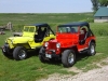 Red 1948 Willys CJ-2A and  Yellow 1946 Willys CJ-2A