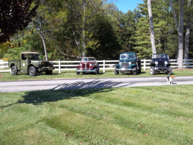1948 Willys CJ-2A, 1949 Jeepster, 1952 Truck, and 1952 M37