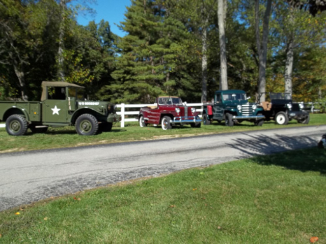 1948 Willys CJ-2A, 1949 Jeepster, 1952 Truck, and 1952 M37